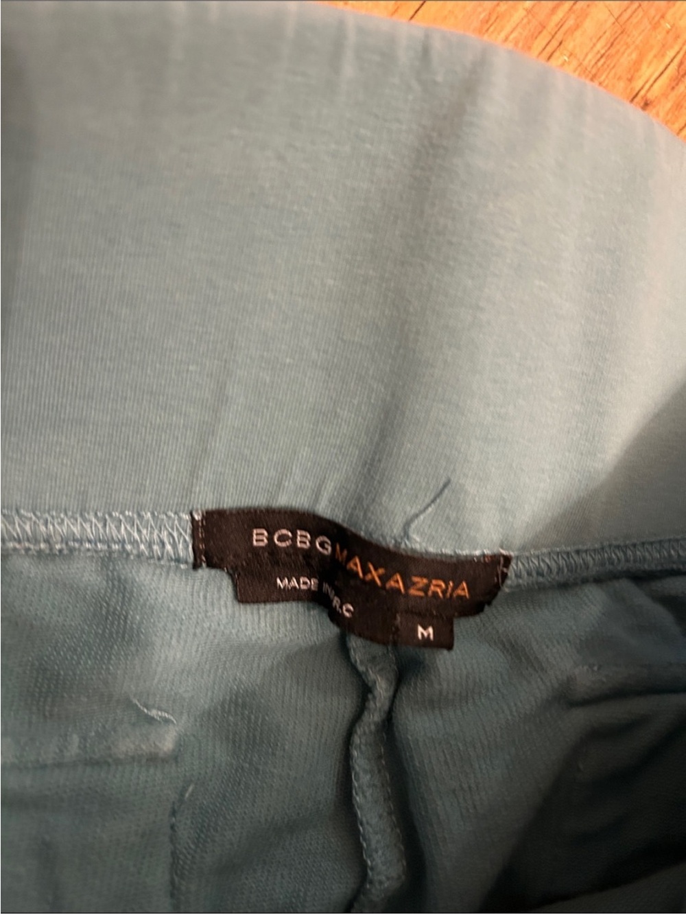 BCBGMaxAzria Teal Flared Leggings with Gold Floral Detail - Picture 6 of 6
